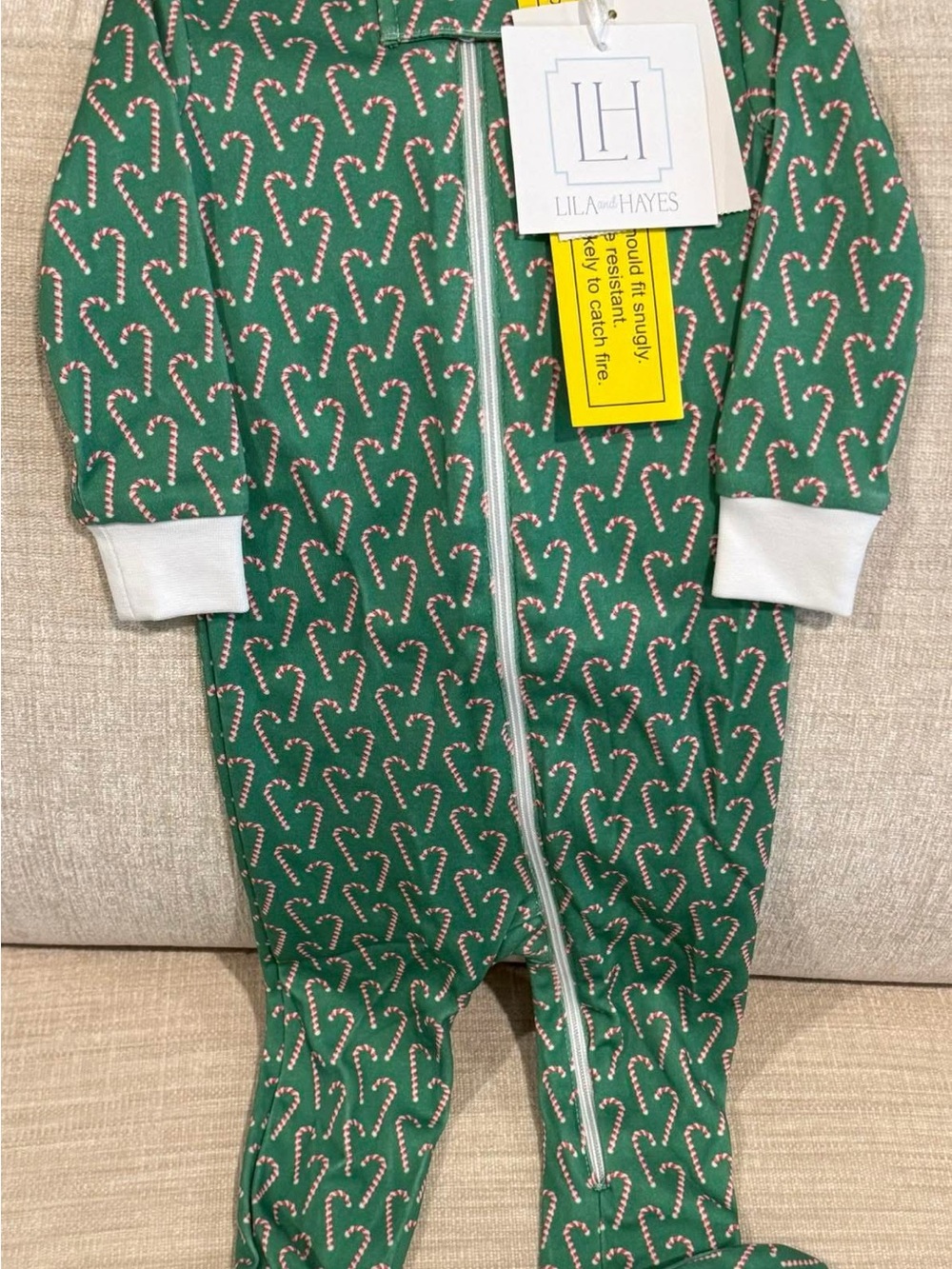 Lila + Hayes Green Candy Cane Kids Footie Pajamas